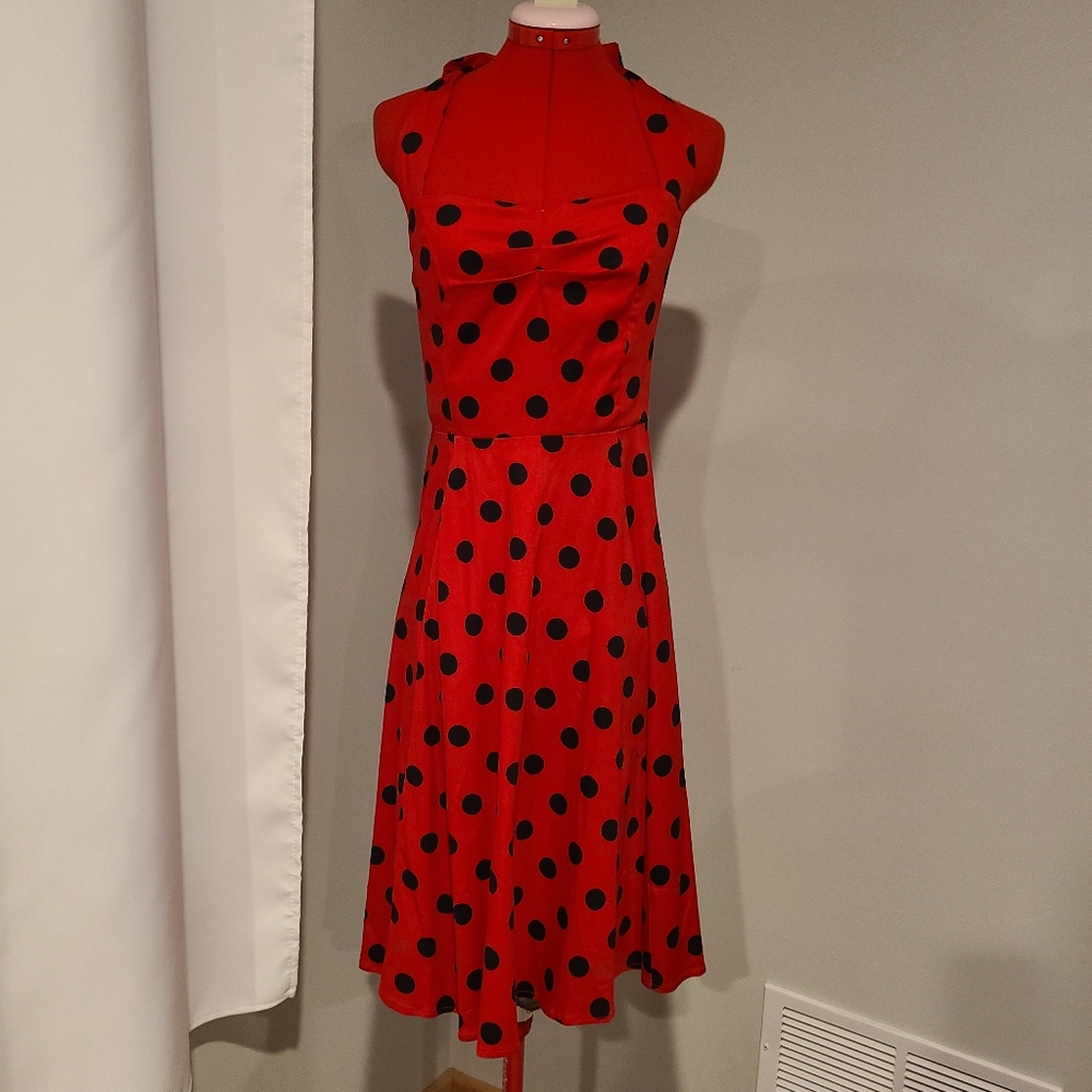 Woman's red and black polkadot swing dress